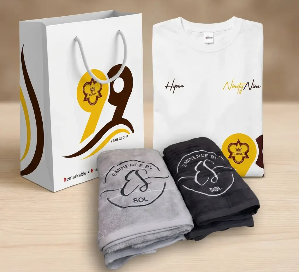 Eminence By SOL | HOPSA 99 Year Group - Embroided Towel, Branded T-Shirt and Paper Bag Souvenirs